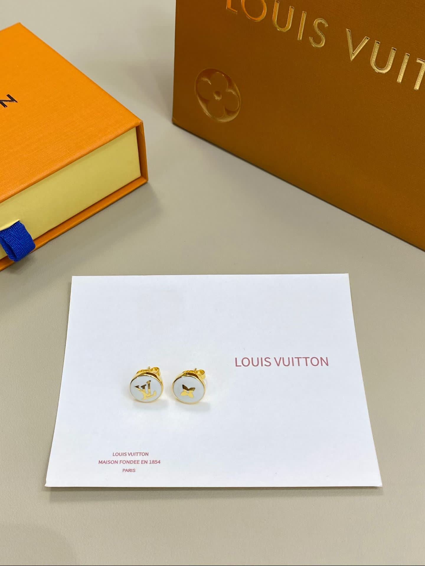 Louis Vuitton White Enamel Earrings